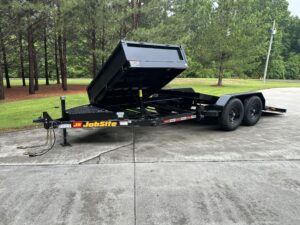Side dump tilt trailer combination by Jobsite Trailers
