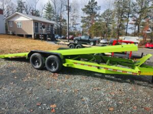 Lime green car hauler with hydraulic tilt deck and removable fenders in North Carolina